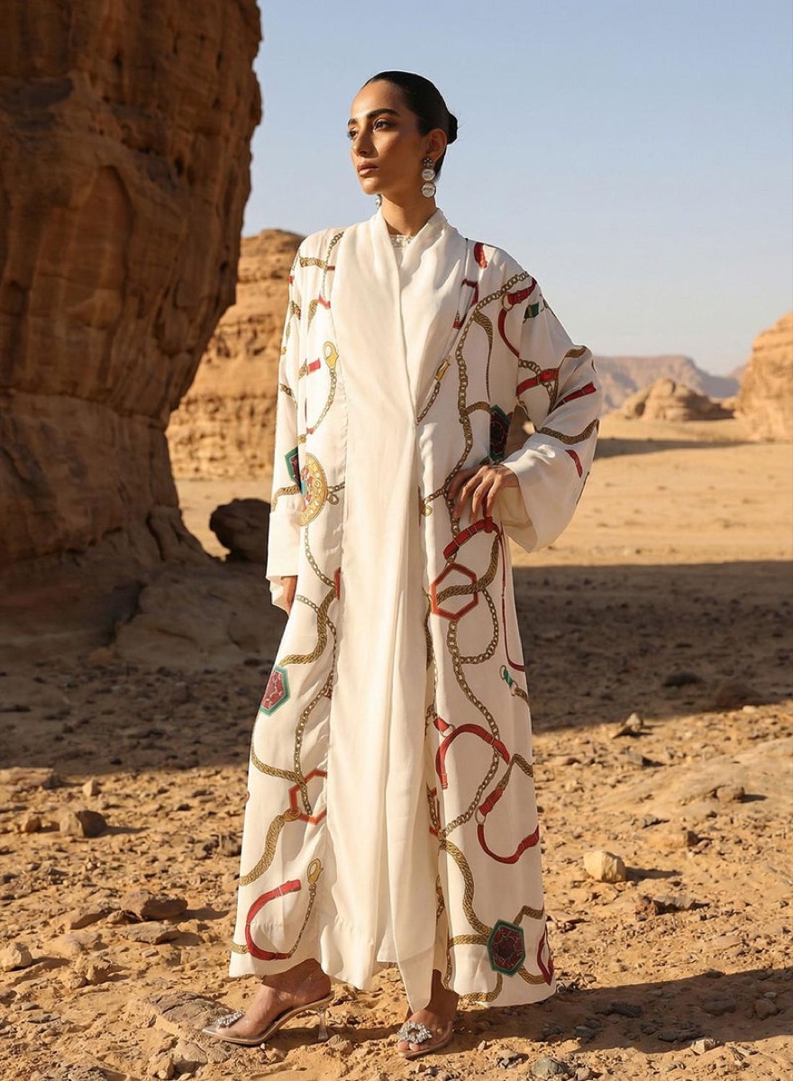 Model wearing a printed layered abaya